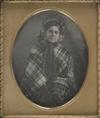 (A SCOTTISH LASS) Artfully tinted sixth-plate daguerreotype portrait of a dark-haired beauty in a blue bonnet and tartan shawl; appropr